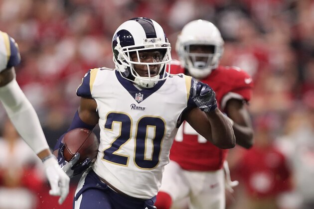 GLENDALE, AZ - DECEMBER 03:  Free safety Lamarcus Joyner #20 of the Los Angeles Rams runs with the football after an interception ahead of wide receiver J.J. Nelson #14 of the Arizona Cardinals during the NFL game at the University of Phoenix Stadium on December 3, 2017 in Glendale, Arizona.  (Photo by Christian Petersen/Getty Images)