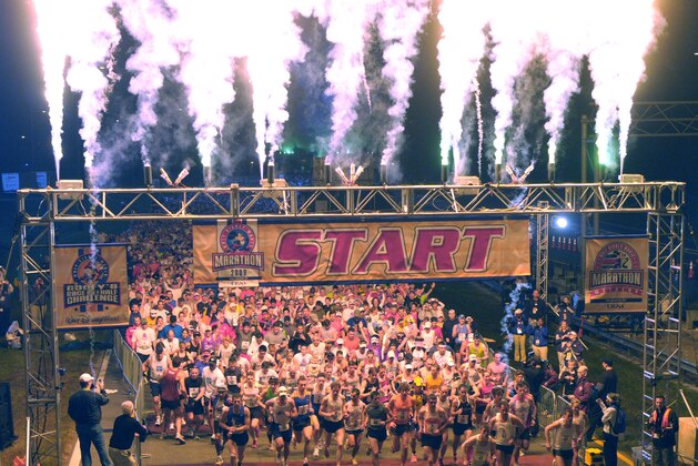 Nearly 22,000 participants head out at the start of the Walt Disney World Marathon in Lake Buena Vista, Fla., Sunday, Jan. 11, 2009. This year's race marked the 16th year of the event. (AP Photo/Phelan M. Ebenhack)