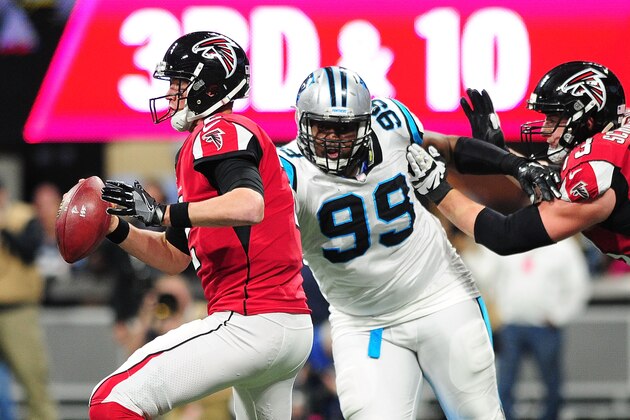ATLANTA, GA - DECEMBER 31: Matt Ryan #2 of the Atlanta Falcons is pressures by Kawann Short #99 of the Carolina Panthers during the first half at Mercedes-Benz Stadium on December 31, 2017 in Atlanta, Georgia. (Photo by Scott Cunningham/Getty Images)
