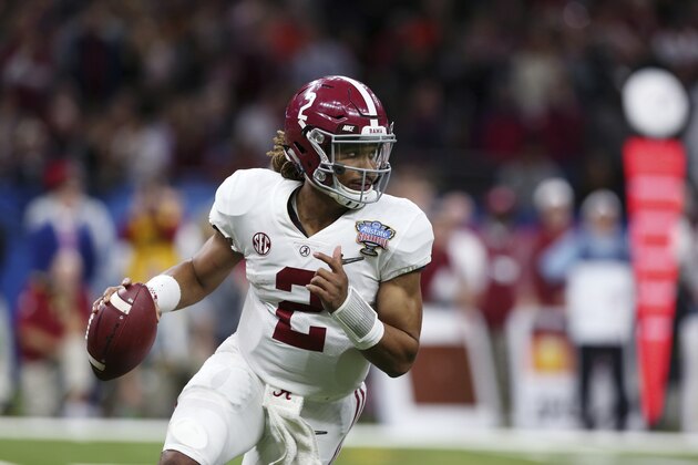 Alabama quarterback Jalen Hurts (2) scrambles in the second half of the Sugar Bowl semi-final playoff game against Clemson for the NCAA college football national championship, in New Orleans, Monday, Jan. 1, 2018. (AP Photo/Rusty Costanza)
