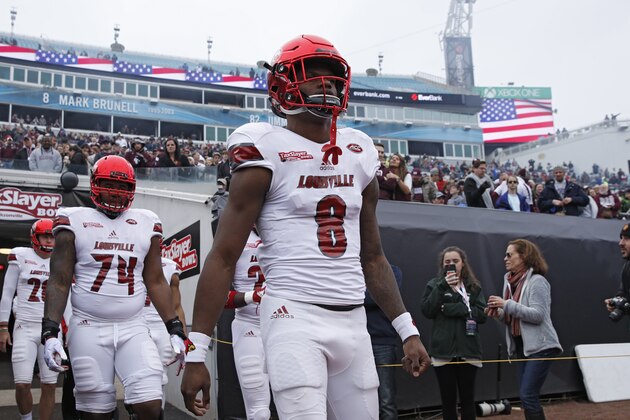 JACKSONVILLE, FL - DECEMBER 30: Lamar Jackson #8 of the Louisville Cardinals takes the field prior to the TaxSlayer Bowl against the Mississippi State Bulldogs at EverBank Field on December 30, 2017 in Jacksonville, Florida. (Photo by Joe Robbins/Getty Images)