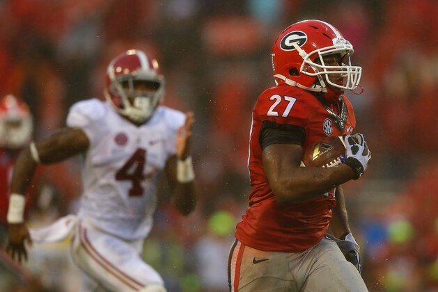 ATHENS, GA - OCTOBER 03:  Nick Chubb #27 of the Georgia Bulldogs rushes for a touchdown against the Alabama Crimson Tide at Sanford Stadium on October 3, 2015 in Athens, Georgia.  (Photo by Kevin C. Cox/Getty Images)