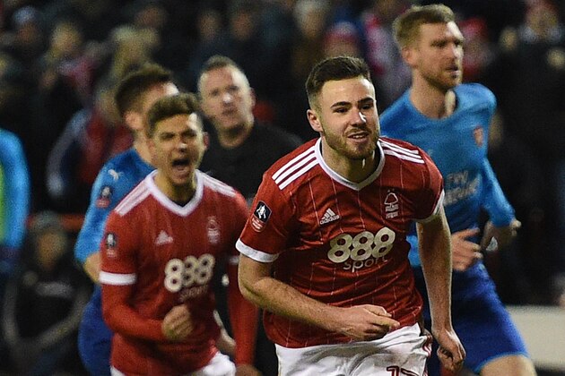 Nottingham Forest's English striker Ben Brereton (R) celebrates scoring the penalty and team's third goal during the English FA Cup third round football match between Nottingham Forest and Arsenal at The City Ground in Nottingham, central England, on January 7, 2018. / AFP PHOTO / Oli SCARFF / RESTRICTED TO EDITORIAL USE. No use with unauthorized audio, video, data, fixture lists, club/league logos or 'live' services. Online in-match use limited to 75 images, no video emulation. No use in betting, games or single club/league/player publications.  /         (Photo credit should read OLI SCARFF/AFP/Getty Images)