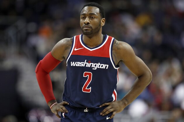 Washington Wizards guard John Wall (2) stands on the court during the second half of an NBA basketball game against the Milwaukee Bucks Saturday, Jan. 6, 2018, in Washington. The Bucks won 110-103. (AP Photo/Alex Brandon)