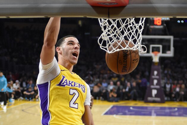Los Angeles Lakers guard Lonzo Ball dunks during the first half of the team's NBA basketball game against the Charlotte Hornets, Friday, Jan. 5, 2018, in Los Angeles. (AP Photo/Mark J. Terrill)
