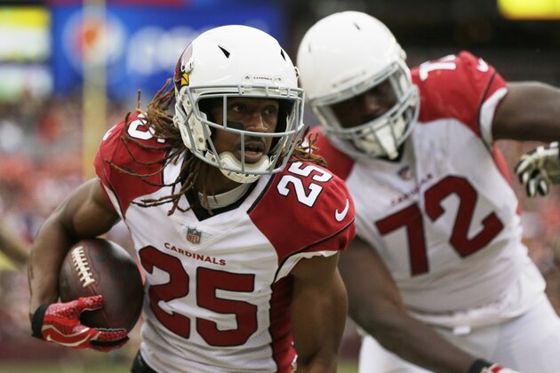 Arizona Cardinals defensive back Tramon Williams (25) runs the ball during an NFL football game against the Washington Redskins, Sunday, Dec. 17, 2017, in Landover, Md. (AP Photo/Mark Tenally)