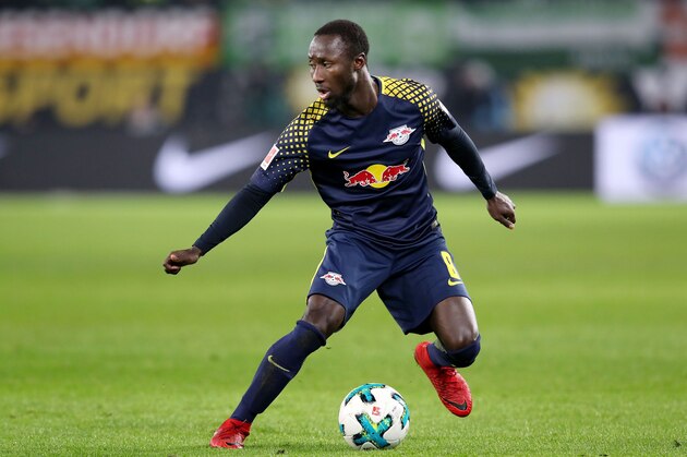 Leipzig's Guinean midfielder Naby Keita runs with the ball during the German first division Bundesliga football match between VfL Wolfsburg and RB Leipzig on December 12, 2017 in Wolfsburg.
 / AFP PHOTO / Ronny Hartmann / RESTRICTIONS: DURING MATCH TIME: DFL RULES TO LIMIT THE ONLINE USAGE TO 15 PICTURES PER MATCH AND FORBID IMAGE SEQUENCES TO SIMULATE VIDEO. == RESTRICTED TO EDITORIAL USE == FOR FURTHER QUERIES PLEASE CONTACT DFL DIRECTLY AT + 49 69 650050
        (Photo credit should read RONNY HARTMANN/AFP/Getty Images)