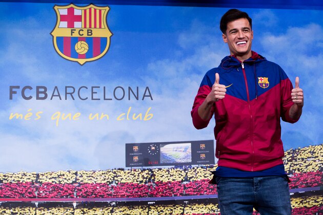 BARCELONA, SPAIN - JANUARY 07:  Philippe Coutinho poses prior to signing his new contract with FC Barcelona at Camp Nou on January 7, 2018 in Barcelona, Spain. The Brazilian player signed from Liverpool, has agreed a deal with the Catalan club until 2023 season.  (Photo by Alex Caparros/Getty Images)