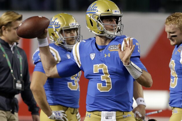 UCLA quarterback Josh Rosen warms up before an NCAA college football bowl game against Kansas State, Tuesday, Dec. 26, 2017, in Phoenix. (AP Photo/Rick Scuteri)