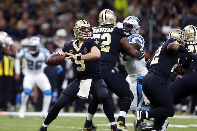 New Orleans Saints quarterback Drew Brees (9) passes in the first half of an NFL football game against the Carolina Panthers in New Orleans, Sunday, Jan. 7, 2018. (AP Photo/Butch Dill)