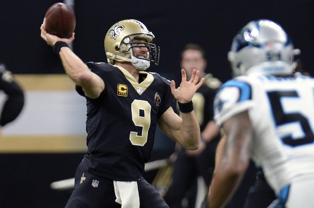 New Orleans Saints quarterback Drew Brees (9) passes in the first half of an NFL football game against the Carolina Panthers in New Orleans, Sunday, Jan. 7, 2018. (AP Photo/Bill Feig)