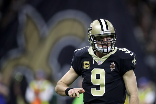 NEW ORLEANS, LA - JANUARY 07:  Drew Brees #9 of the New Orleans Saints reacts after throwing a touchdown pass against the Carolina Panthers at the Mercedes-Benz Superdome on January 7, 2018 in New Orleans, Louisiana.  (Photo by Chris Graythen/Getty Images)