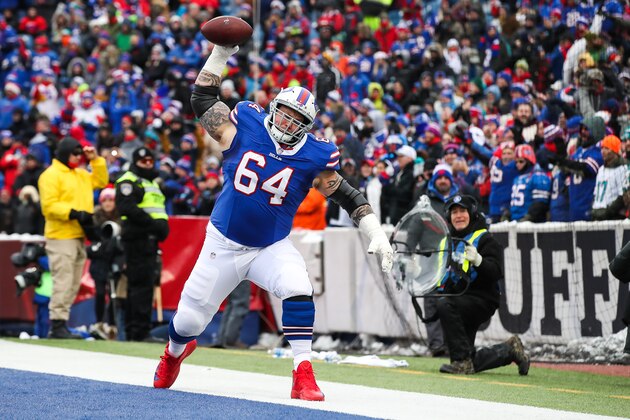 ORCHARD PARK, NY - DECEMBER 17:  Richie Incognito #64 of the Buffalo Bills spikes the ball after LeSean McCoy #25 of the Buffalo Bills scored a touchdown during the first quarter against the Miami Dolphins on December 17, 2017 at New Era Field in Orchard Park, New York.  (Photo by Tom Szczerbowski/Getty Images)