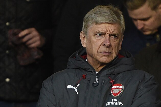 Arsenal's French manager Arsene Wenger looks on from the stands during the English FA Cup third round football match between Nottingham Forest and Arsenal at The City Ground in Nottingham, central England, on January 7, 2018. / AFP PHOTO / Oli SCARFF / RESTRICTED TO EDITORIAL USE. No use with unauthorized audio, video, data, fixture lists, club/league logos or 'live' services. Online in-match use limited to 75 images, no video emulation. No use in betting, games or single club/league/player publications.  /         (Photo credit should read OLI SCARFF/AFP/Getty Images)