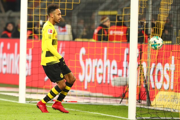 DORTMUND, GERMANY - DECEMBER 16: Pierre-Emerick Aubameyang of Dortmund scores the team`s first goal during the Bundesliga match between Borussia Dortmund and TSG 1899 Hoffenheim at Signal Iduna Park on December 16, 2017 in Dortmund, Germany. (Photo by TF-Images/TF-Images via Getty Images)
