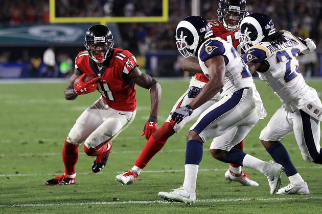 LOS ANGELES, CA - JANUARY 06:  Julio Jones #11 of the Atlanta Falcons attempts to get past the Los Angeles Rams during first half of the NFC Wild Card Playoff Game at the Los Angeles Coliseum on January 6, 2018 in Los Angeles, California.  (Photo by Sean M. Haffey/Getty Images)