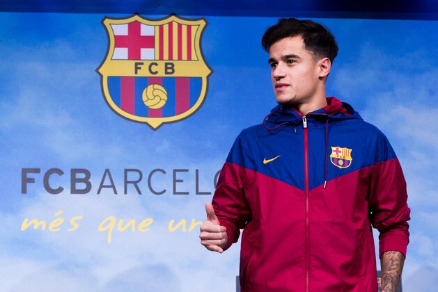BARCELONA, SPAIN - JANUARY 07:  Philippe Coutinho poses prior to signing his new contract with FC Barcelona at Camp Nou on January 7, 2018 in Barcelona, Spain. The Brazilian player signed from Liverpool, has agreed a deal with the Catalan club until 2023 season.  (Photo by Alex Caparros/Getty Images)