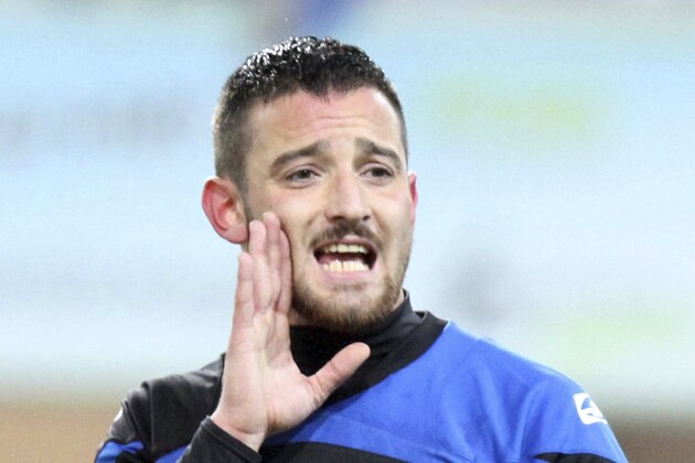 FILE - The March 1, 2013 file photo shows soccer player Denis Naki during a German second league match in Paderborn, western Germany. Naki told German newspaper FILE - The March 1, 2013 file photo shows soccer player Denis Naki during a German second league match in Paderborn, western Germany. Naki told German newspaper