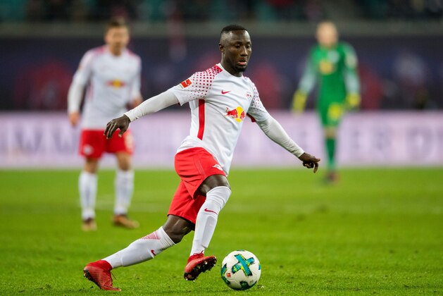 Leipzig's Guinean midfielder Naby Keita plays the ball during the German first division Bundesliga football match between RB Leipzig and Hertha BSC Berlin in Leipzig, eastern Germany on December 17, 2017.  / AFP PHOTO / ROBERT MICHAEL / RESTRICTIONS: DURING MATCH TIME: DFL RULES TO LIMIT THE ONLINE USAGE TO 15 PICTURES PER MATCH AND FORBID IMAGE SEQUENCES TO SIMULATE VIDEO. == RESTRICTED TO EDITORIAL USE == FOR FURTHER QUERIES PLEASE CONTACT DFL DIRECTLY AT + 49 69 650050
        (Photo credit should read ROBERT MICHAEL/AFP/Getty Images)