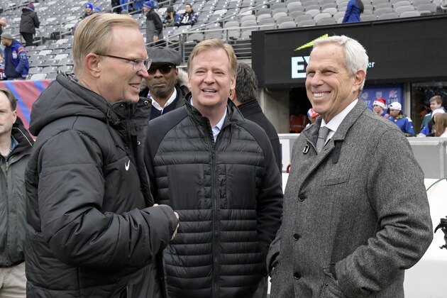 NFL commissioner Roger Goodell, center, talks to New York Giants owners John Mara, left, and Steve Tisch prior to an NFL football game against the Philadelphia Eagles, Sunday, Dec. 17, 2017, in East Rutherford, N.J. (AP Photo/Bill Kostroun)