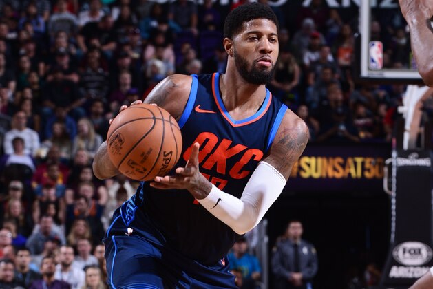 PHOENIX, AZ - JANUARY 7: Paul George #13 of the Oklahoma City Thunder handles the ball during the game against the Phoenix Suns on January 7, 2018 at Talking Stick Resort Arena in Phoenix, Arizona. NOTE TO USER: User expressly acknowledges and agrees that, by downloading and or using this photograph, user is consenting to the terms and conditions of the Getty Images License Agreement. Mandatory Copyright Notice: Copyright 2018 NBAE (Photo by Michael Gonzales/NBAE via Getty Images)