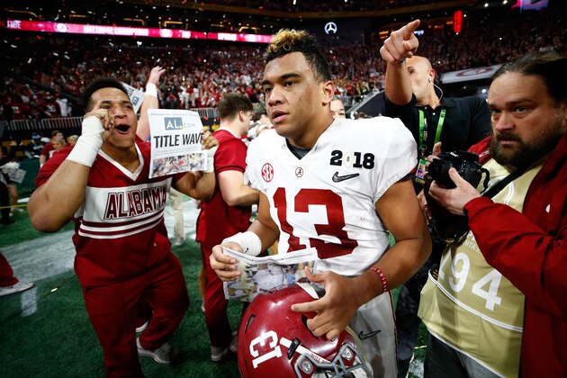 ATLANTA, GA - JANUARY 08:  Tua Tagovailoa #13 of the Alabama Crimson Tide celebrates beating the Georgia Bulldogs in overtime to win the CFP National Championship presented by AT&T at Mercedes-Benz Stadium on January 8, 2018 in Atlanta, Georgia.  (Photo by Jamie Squire/Getty Images)