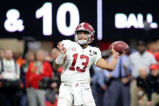 ATLANTA, GA - JANUARY 08:  Tua Tagovailoa #13 of the Alabama Crimson Tide throws a pass during the second half against the Georgia Bulldogs in the CFP National Championship presented by AT&T at Mercedes-Benz Stadium on January 8, 2018 in Atlanta, Georgia.  (Photo by Streeter Lecka/Getty Images)