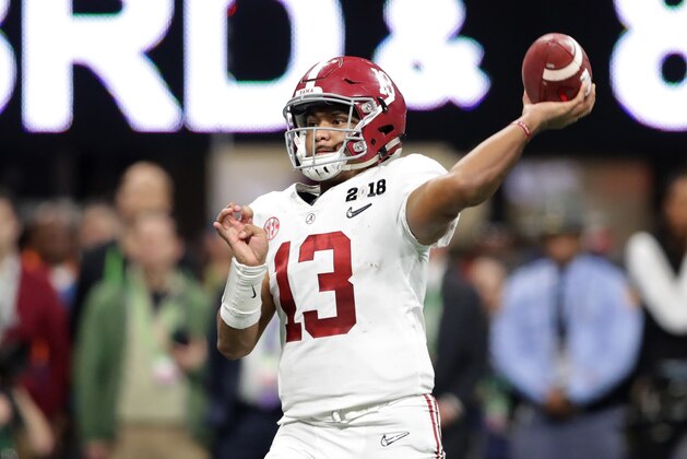 ATLANTA, GA - JANUARY 08: Tua Tagovailoa #13 of the Alabama Crimson Tide throws a pass during the second half against the Georgia Bulldogs in the CFP National Championship presented by AT&T at Mercedes-Benz Stadium on January 8, 2018 in Atlanta, Georgia.  (Photo by Streeter Lecka/Getty Images)