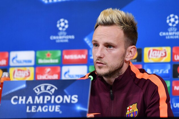 Barcelona's Ivan Rakitic attends a press conference ahead of Wednesday's Champions League soccer match against Juventus, at the Allianz Stadium in Turin, Italy, Tuesday, Nov. 21, 2017. (Alessandro Di Marco/ANSA via AP)