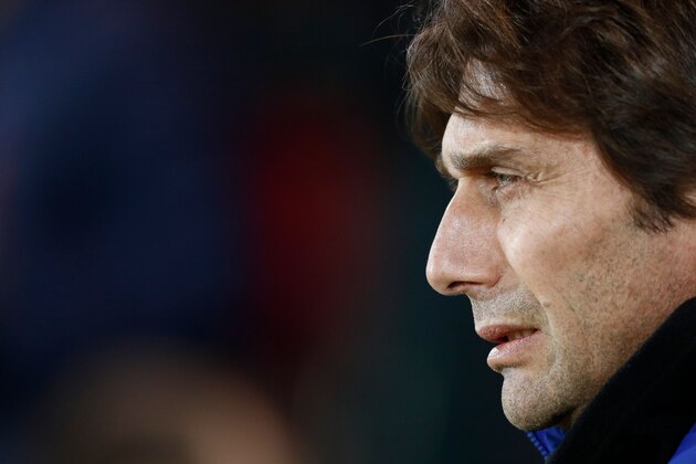 Chelsea's Italian head coach Antonio Conte waits for kick off of the English FA Cup third round football match between Norwich City and Chelsea at Carrow Road in Norwich, north east England on January 6, 2018. / AFP PHOTO / Adrian DENNIS / RESTRICTED TO EDITORIAL USE. No use with unauthorized audio, video, data, fixture lists, club/league logos or 'live' services. Online in-match use limited to 75 images, no video emulation. No use in betting, games or single club/league/player publications.  /         (Photo credit should read ADRIAN DENNIS/AFP/Getty Images)