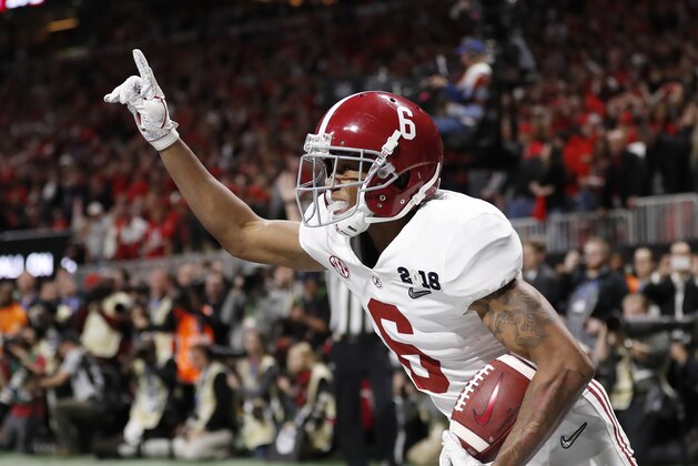 Alabama wide receiver DeVonta Smith (6) celebrates his touchdown during overtime of the NCAA college football playoff championship game against Georgia, Monday, Jan. 8, 2018, in Atlanta. Alabama won 26-23 in overtime. (AP Photo/David Goldman)