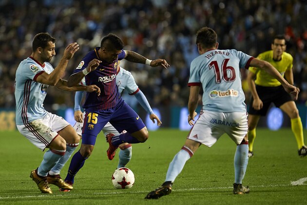 VIGO, SPAIN - JANUARY 04:  Jose Paulo Bezerra 'Paulinho' (C) of FC Barcelona in action during the Copa del Rey, Round of 16, first Leg match between Celta de Vigo and FC Barcelona at Estadio de Balaidos on January 4, 2018 in Vigo, Spain.  (Photo by fotopress/Getty Images)