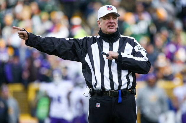 GREEN BAY, WI - DECEMBER 24:  Referee Jeff Triplette #42 calls a penalty in the third quarter during the game between the Green Bay Packers and the Minnesota Vikings at Lambeau Field on December 24, 2016 in Green Bay, Wisconsin. (Photo by Dylan Buell/Getty Images)
