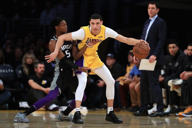 LOS ANGELES, CA - JANUARY 09:  De'Aaron Fox #5 of the Sacramento Kings defends against the dribble of Lonzo Ball #2 of the Los Angeles Lakers during the first half of a game at Staples Center on January 9, 2018 in Los Angeles, California.   NOTE TO USER: User expressly acknowledges and agrees that, by downloading and or using this photograph, User is consenting to the terms and conditions of the Getty Images License Agreement.  (Photo by Sean M. Haffey/Getty Images)