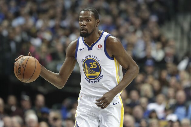 Golden State Warriors forward Kevin Durant dribbles during the first half of an NBA basketball game against the Dallas Mavericks in Dallas, Wednesday, Jan. 3, 2018. (AP Photo/LM Otero)
