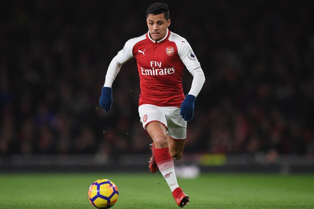 LONDON, ENGLAND - JANUARY 03:  Alexis Sanchez of Arsenal runs with ball during the Premier League match between Arsenal and Chelsea at Emirates Stadium on January 3, 2018 in London, England.  (Photo by Shaun Botterill/Getty Images)