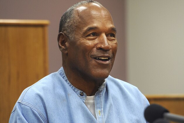 Former NFL football star O.J. Simpson appears via video for his parole hearing at the Lovelock Correctional Center in Lovelock, Nev., on Thursday, July 20, 2017.  Simpson was granted parole Thursday after more than eight years in prison for a Las Vegas hotel heist, successfully making his case in a nationally televised hearing that reflected America's enduring fascination with the former football star.  (Jason Bean/The Reno Gazette-Journal via AP, Pool)