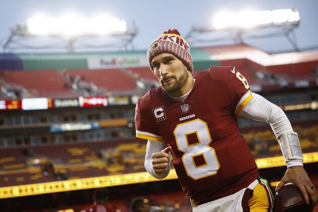 Washington Redskins quarterback Kirk Cousins (8) runs off the field after an NFL football game against Arizona Cardinals in Landover, Md., Sunday, Dec 17, 2017. The Redskins defeated the Cardinals 20-15. (AP Photo/Patrick Semansky)