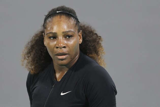 Serena Williams, of the U.S., reacts in an exhibition match against Jelena Ostapenko, of Latvia, during the final day of the Mubadala World Tennis Championship in Abu Dhabi, United Arab Emirates, Saturday, Dec. 30, 2017. (AP Photo/Kamran Jebreili)