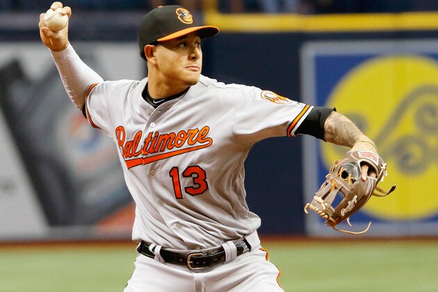 ST. PETERSBURG, FL - OCTOBER 1: Manny Machado #13 of the Baltimore Orioles throws a runner out in the bottom of the second inning of the game against the Tampa Bay Rays at Tropicana Field on October 1, 2017 in St. Petersburg, Florida. (Photo by Joseph Garnett Jr./Getty Images)