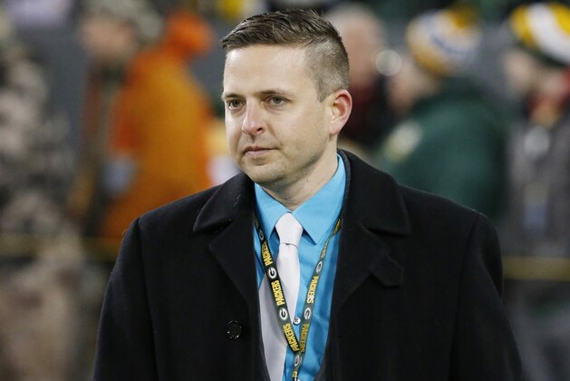 Green Bay Packers Eliot Wolf walks on the field before an NFL football game against the Minnesota Vikings Sunday, Jan. 3, 2016, in Green Bay, Wis. (AP Photo/Mike Roemer)