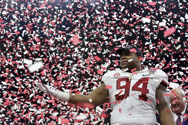 Alabama defensive lineman Da'Ron Payne (94) celebrates after being selected most valuable defensive player, after the Sugar Bowl semi-final playoff game against Clemson for the NCAA college football national championship, in New Orleans, Monday, Jan. 1, 2018. Alabama won 24-6 to advance to the national championship game. (AP Photo/Rusty Costanza)