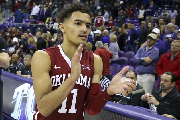Oklahoma guard Trae Young (11) celebrates after the 90-89 win over TCU in an NCAA college basketball game, Saturday, Dec. 30, 2017. (AP Photo/ Richard W. Rodriguez)