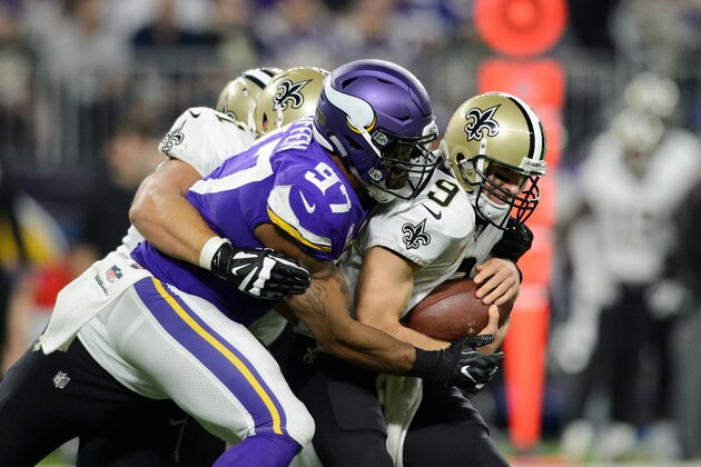 MINNEAPOLIS, MN - SEPTEMBER 11: Everson Griffen #97 of the Minnesota Vikings sacks Drew Brees #9 of the New Orleans Saints during the game on September 11, 2017 at U.S. Bank Stadium in Minneapolis, Minnesota. The Vikings defeated the Saints 29-19. (Photo by Hannah Foslien/Getty Images)
