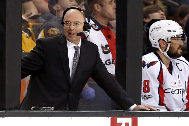 Pierre McGuire broadcasts during the third period of an NHL hockey game between the Boston Bruins and the Washington Capitals n Boston Saturday, April 8, 2017. (AP Photo/Winslow Townson)