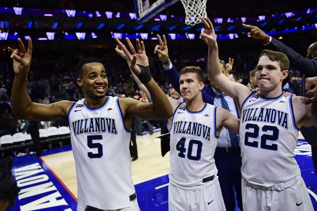 PHILADELPHIA, PA - JANUARY 10: (L-R) Phil Booth #5, Denny Grace #40 and Peyton Heck #22 of the Villanova Wildcats celebrate the win over the Xavier Musketeers during the second half at the Wells Fargo Center on January 10, 2018 in Philadelphia, Pennsylvania. Booth was the leading scorer with 21 points and Villanova won 89-65. (Photo by Corey Perrine/Getty Images)
