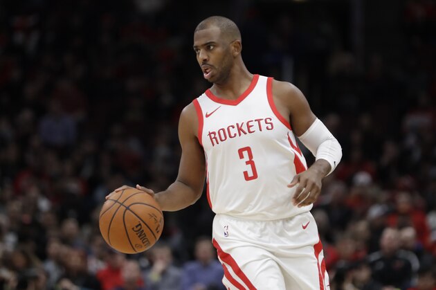 Houston Rockets' Chris Paul sets up a play during the first half of an NBA basketball game Monday, Jan. 8, 2018, in Chicago. (AP Photo/Charles Rex Arbogast)