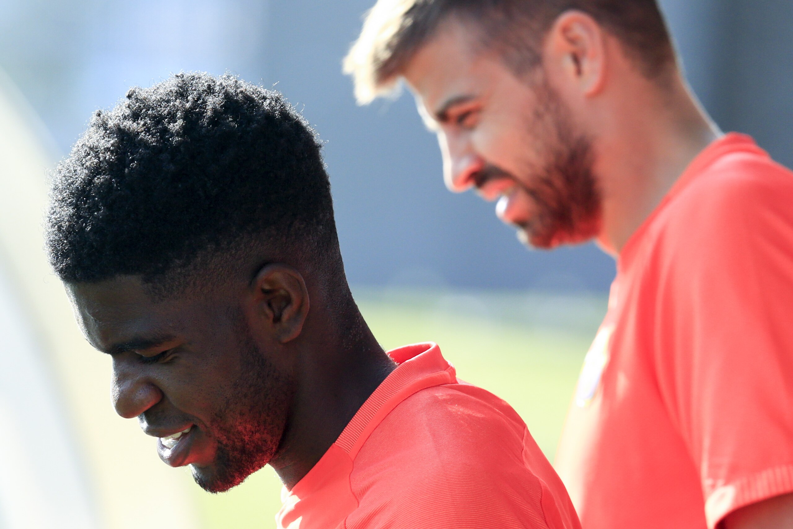 Barcelona's French defender Samuel Umtiti (L) and Barcelona's defender Gerard Pique arrive to a training session at the Sports Center FC Barcelona Joan Gamper in Sant Joan Despi, near Barcelona on August 19, 2016 / AFP / PAU BARRENA (Photo credit should read PAU BARRENA/AFP/Getty Images) Barcelona's French defender Samuel Umtiti (L) and Barcelona's defender Gerard Pique arrive to a training session at the Sports Center FC Barcelona Joan Gamper in Sant Joan Despi, near Barcelona on August 19, 2016 / AFP / PAU BARRENA (Photo credit should read PAU BARRENA/AFP/Getty Images)
