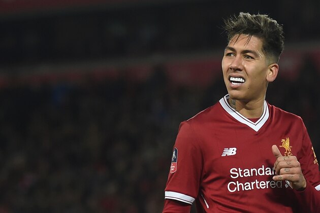 Liverpool's Brazilian midfielder Roberto Firmino reacts during the English FA Cup third round football match between Liverpool and Everton at Anfield in Liverpool, north west England on January 5, 2018. / AFP PHOTO / PAUL ELLIS / RESTRICTED TO EDITORIAL USE. No use with unauthorized audio, video, data, fixture lists, club/league logos or 'live' services. Online in-match use limited to 75 images, no video emulation. No use in betting, games or single club/league/player publications.  /         (Photo credit should read PAUL ELLIS/AFP/Getty Images)