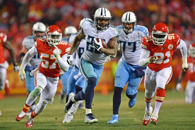 KANSAS CITY, MO - JANUARY 6:  Running back Derrick Henry #22 of the Tennessee Titans runs up field for a touchdown during the second half of the game against the Kansas City Chiefs at Arrowhead Stadium on January 6, 2018 in Kansas City, Missouri. (Photo by Peter G. Aiken/Getty Images)